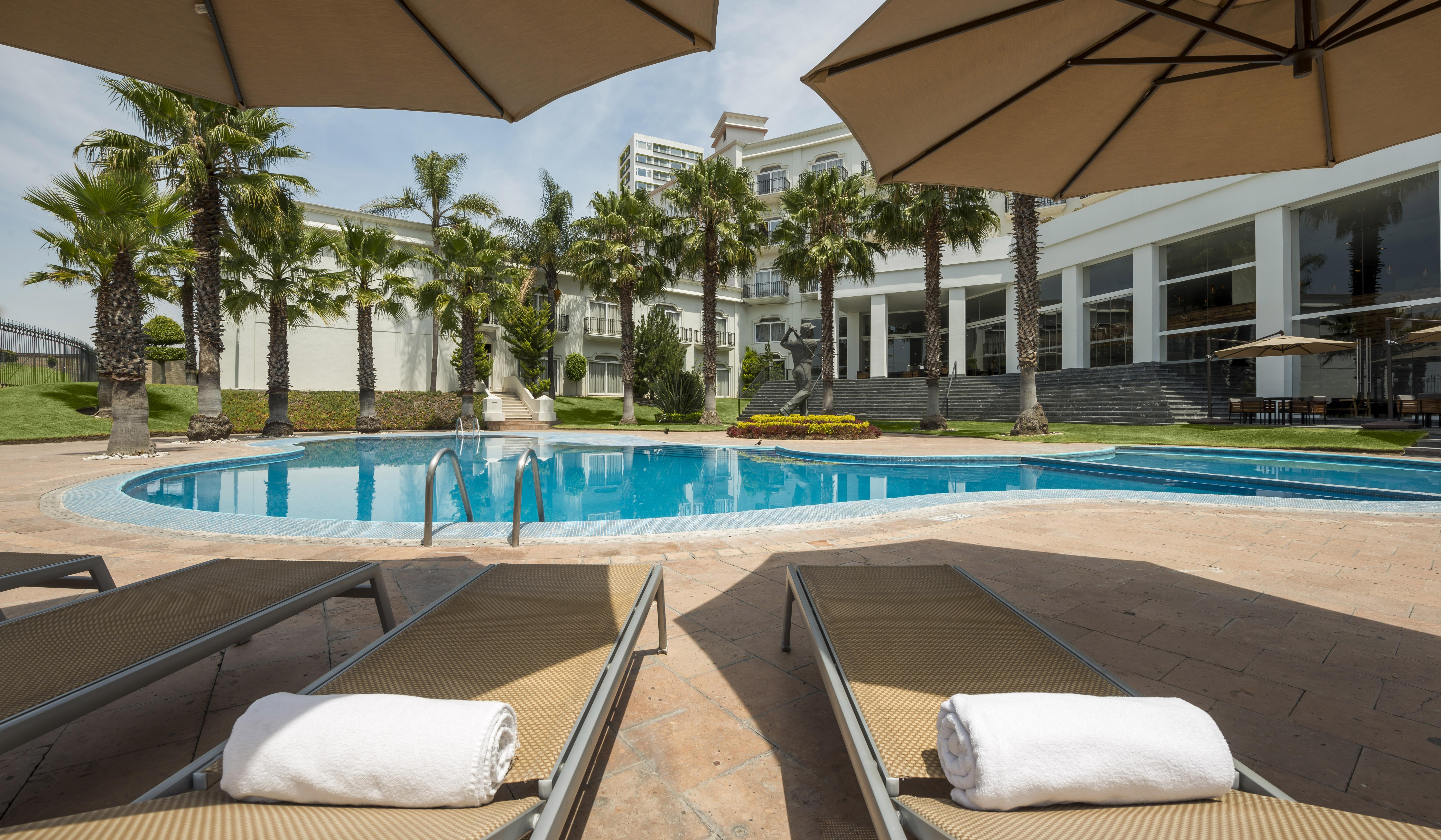 Camino Real Puebla Angelopolis Otel Dış mekan fotoğraf Pool at the hotel